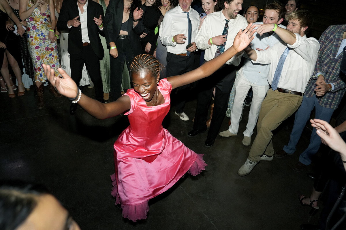 Olamide Olayiwola tears it up in the center of a dance circle on April 27 at Cornerstone during Senior Prom to account for the fact most high school seniors four years ago weren’t able to have proms nationwide due to COVID. It was well organized, well attended and just the right amount of wild. This was the first year of the dance and all although it’s uncertain of its continuance, it was a hit. Photo by Jamie Cotten / Colorado College